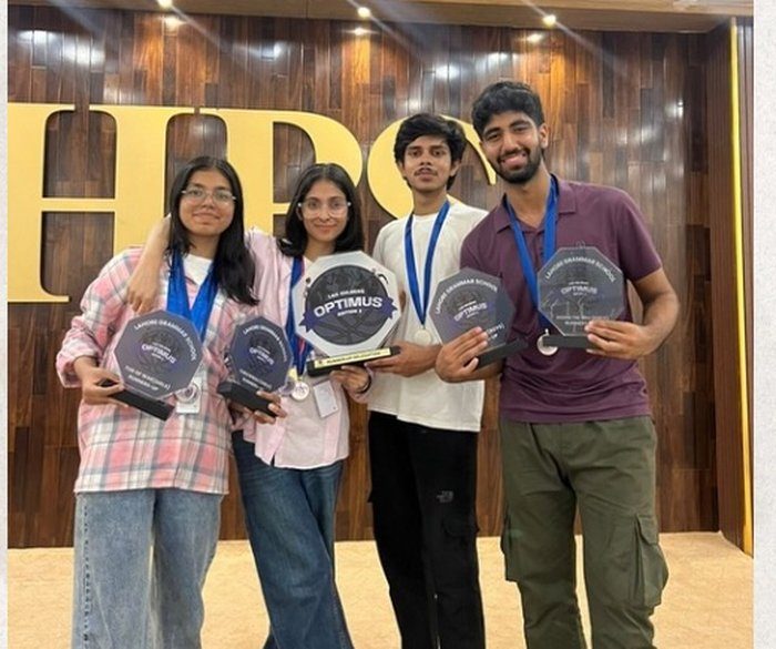 HPS students with trophies at LGS Optimus